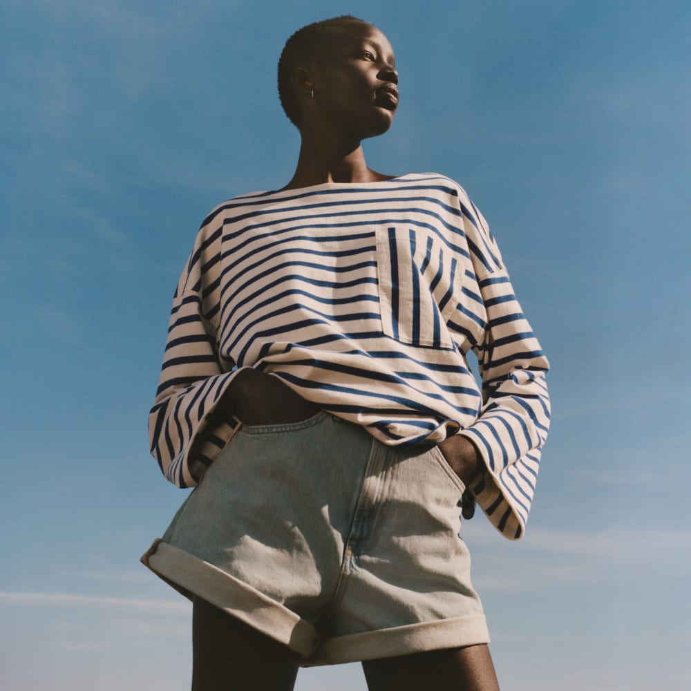 The Premium Weight Oversized Pocket Tee in Canvas Tan / Mazarine Blue — detail view